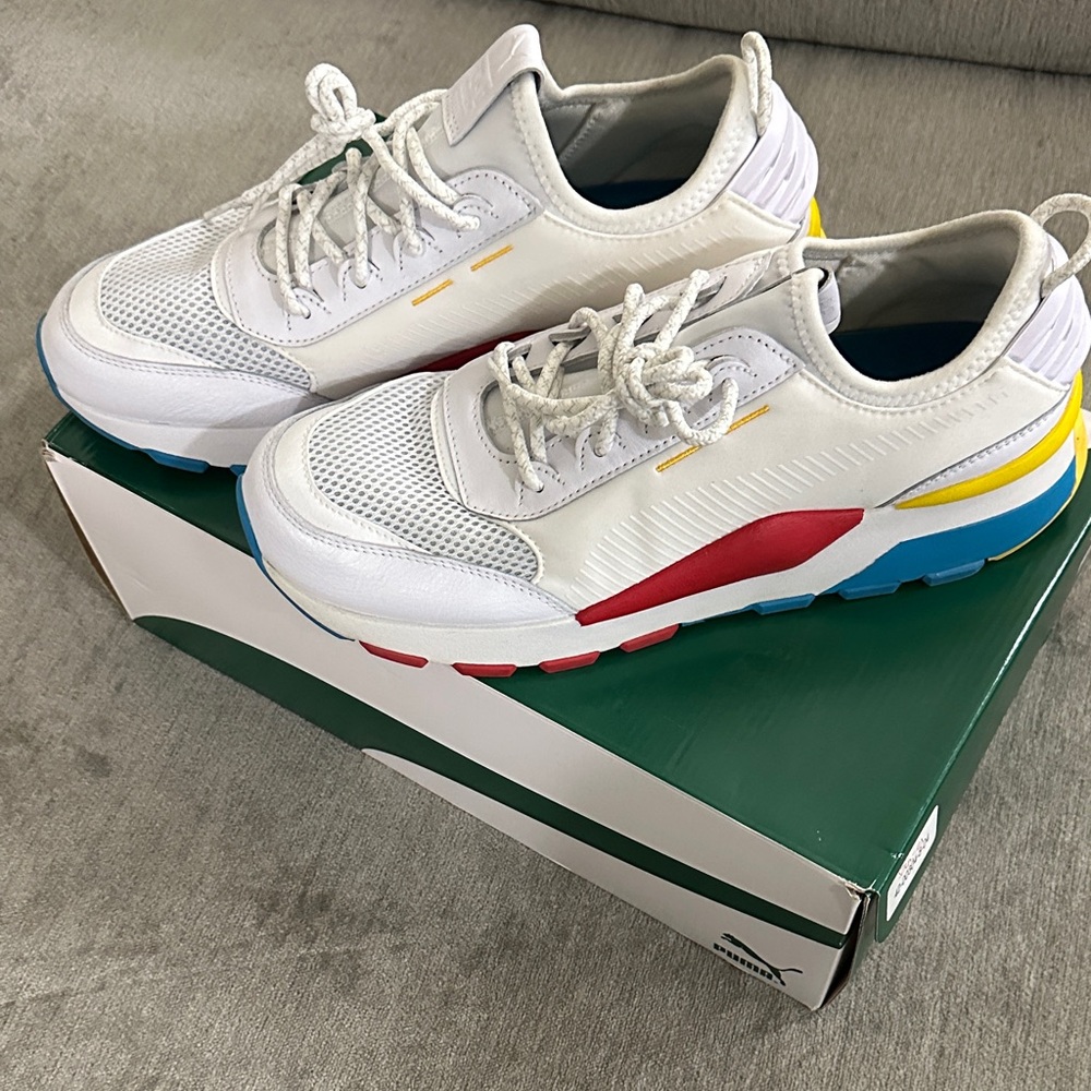 Puma White Sneakers with Red, Yellow, and Blue Accents
